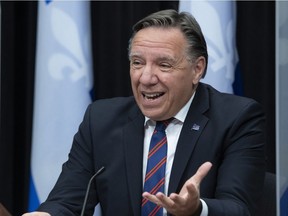 Quebec Premier Francois Legault responds to reporters questions during a news conference on the COVID-19 pandemic, Tuesday, October 20, 2020 at the legislature in Quebec City.