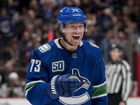 Forward Tyler Toffoli (73) celebrates a goal scored by  forward J.T. Miller (9) of the Vancouver Canucks against the Minnesota Wild in the third period during a game at Rogers Arena on Feb. 19, 2020.
