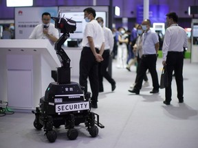 A security robot is seen at a booth during Huawei Connect in Shanghai, China, Sept. 23, 2020.
