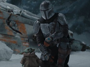 Baby Yoda it's cold outside: Pedro Pascal and The Child in The Mandalorian, which returns Oct. 30.
