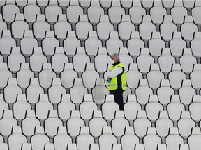 Juventus vs. Napoli : A staff member in the stands as Napoli does not travel for the match  at Allianz Stadium in Turin, Italy, on Sunday, Oct. 4, 2020.