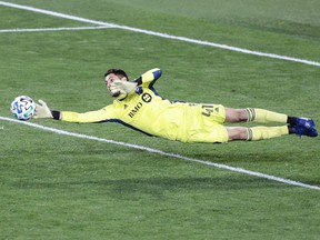 Montreal Impact goalkeeper James Pantemis makes a diving save against Inter Miami at Red Bull Arena on Saturday, Oct 17, 2020, in Harrison, N.J.