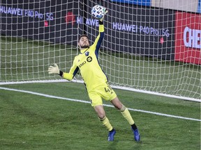 Montreal Impact goalkeeper James Pantemis makes a save on a shot by Inter Miami midfielder Lewis Morgan, not pictured, during the second half at Red Bull Arena in Harrison, N.J., on Oct. 17, 2020