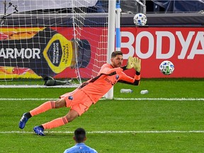 Impact goalkeeper James Pantemis makes a save against New York City during MLS game at Yankee Stadium on Oct. 24.