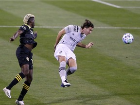 Montreal Impact defender Luis Binks (5) and Columbus Crew forward Gyasi Zerdes (11) during the first half half at MAPFRE Stadium in Columbus, Ohio on Oct. 7, 2020.