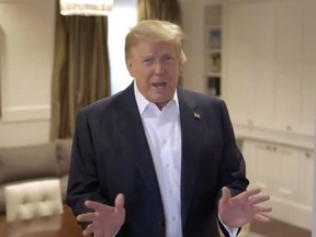 U.S. President Donald Trump makes an announcement from the Walter Reed National Military Medical Center, where he is being treated for the coronavirus disease (COVID-19), in Bethesda, Maryland, on Sunday, Oct. 4, 2020.