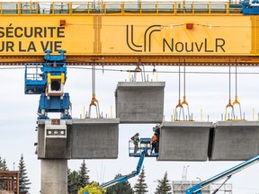 Construction of the REM along Highway 40 at Sources Blvd. in Dollard-des-Ormeaux Sept. 24, 2020.