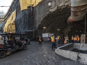 Workers conduct excavation work at the new Côte-Vertu garage site in the St-Laurent borough in May 2018. The work was expected to be completed by November 2019 but was delayed.