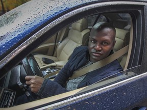 Joël DeBellefeuille is seen in his BMW in Montreal on Oct. 28, 2015.