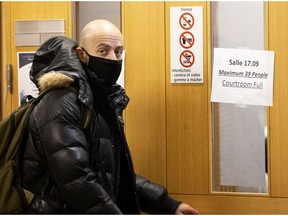 Paul Eid, a Université du Québec a Montréal sociology professor arrives at the Montreal courthouse on Monday before testifying. He said studies he reviewed show that "Muslims are systematically the most stigmatized" religious group in Quebec and the rest of Canada.