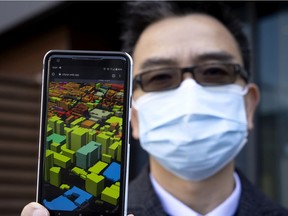 Concordia University civil, building and environmental engineering professor Leon Wang displays his web-based application designed to help property owners reduce the spread of the coronavirus.