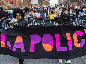 Demonstrators take to the streets of N.D.G. in the wake of the police shooting of Sheffield Matthews by Montreal police in the early hours of Oct. 29.