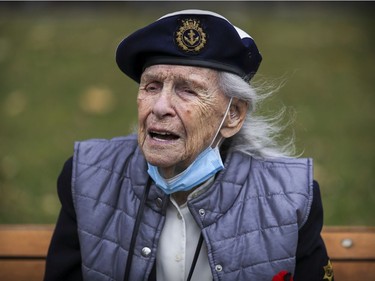96 year-old veteran Violet Drummond watched the scaled-down Remembrance Day ceremony at the Cenotaph from a bench in Montreal's Place du Canada in 2020.