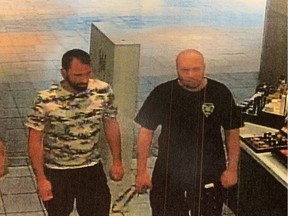 Tommy Dugas, left, and Sébastien Solarek in a photo from a surveillance camera in The Bay at the Fairview Mall in Pointe-Claire on June 30, 2018, minutes before Dugas was killed.