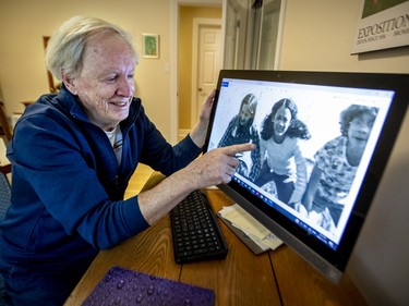 MONTREAL, QUE.: NOVEMBER 19, 2020 -- Retired educator Richard Mason looks at a photo of US vice president-elect Kamala Harris from her days as a student at FACE school from his cell phone onto his television, at his home outside of Knowlton, east of Montreal Thursday November 19, 2020.  Mason was Harris's math teacher when she attended FACE school in 1976 to '78, before she attended Westmount High School. (John Mahoney / MONTREAL GAZETTE) ORG XMIT: 65346 - 8478