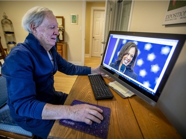 MONTREAL, QUE.: NOVEMBER 19, 2020 -- Retired educator Richard Mason looks at photos of US vice president-elect Kamala Harris at his home outside of Knowlton, east of Montreal Thursday November 19, 2020.  Mason was Harris's math teacher when she attended FACE school in 1976 to '78, before she attended Westmount High School. (John Mahoney / MONTREAL GAZETTE) ORG XMIT: 65346 - 8393