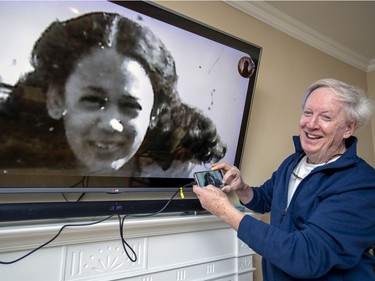 Retired educator Richard Mason projects a photo Kamala Harris from her days as a student at FACE school from his cellphone onto his television at his home near Knowlton on Thursday, Nov. 19, 2020.  Mason was Harris's math teacher when she attended FACE school in 1976 to '78, before she attended Westmount High School.