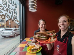 Sisters Melanie and Brigitte Eichholz (right) co-own and operate TWIGS Café in Sainte-Anne-de-Bellevue. They have coped during pandemic by offering take-out. EDITOR'S NOTE: Masks were removed while this photograph was being taken and all physical distancing protocols were respected.