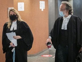 Crown prosecutor Annabelle Sheppard, left, and defence lawyer Vincent Rose leave courtroom during trial of Chad Ofter on Monday Nov. 30, 2020.