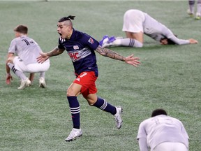 Gustavo Bou celebrates after scoring the winning goal for the Revolution against the Impact with only seconds remaining before the teams would have headed to extra time.