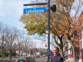 St-Laurent mayor Alan DeSousa shows off the borough's more legible street signs.
