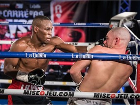 Junior Ulysse, left, lands a punch on Mathieu Germain during their fight Saturday, Nov. 21, 2020, in Rimouski.