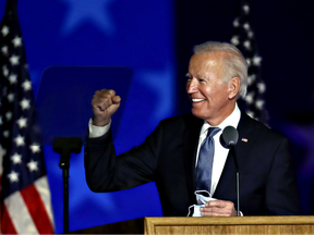 Joe Biden gestures while arriving during an election night party in Wilmington, Del., U.S., on Wednesday, Nov. 4, 2020.