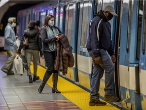 Transit users wear masks while riding the métro in Montreal on Thursday October 22, 2020.