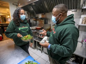 “When people realize the barriers that are put in front of Black people trying to start their businesses ... maybe that pushes them to encourage (those businesses) more,” says Resto Palme co-owner Lee-Anne Millaire Lafleur, with chef/husband Ralph Alerte.