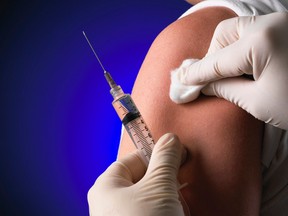 A person receives a vaccine.