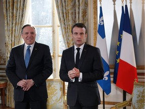 French President Emmanuel Macron, right, and Quebec Premier François Legault at the Palais de l'Élysée in Paris in 2019.