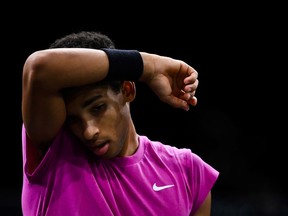 Canada's Felix Auger-Aliassime reacts as he plays against Croatia's Marin Cilic during their men's singles first round tennis match on day 1 at the ATP World Tour Masters 1000 - Paris Masters (Paris Bercy) - indoor tennis tournament at The AccorHotels Arena in Paris on November 2, 2020.