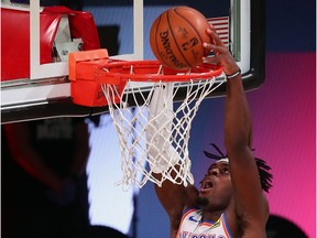 Montrealer and Oklahoma City Thunder guard Luguentz Dort dunks against the Houston Rockets during the second half of Game 7 of the first round of the 2020 NBA Playoffs at Lake Buena Vista, Fla., on Sept. 2, 2020.