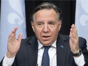 Quebec Premier François Legault responds to reporters during a news conference on the COVID-19 pandemic, Tuesday, Nov. 24, 2020 at the legislature in Quebec City.