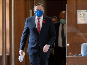 Quebec Premier François Legault walks to a news conference on the COVID-19 pandemic on Nov. 3, 2020, at the legislature in Quebec City. “My message to you today is: Keep the faith,” he told the CAQ's policy convention on Saturday, Nov. 7, 2020.