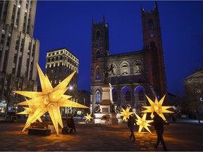 Christmas decorations are seen in front of the Notre-Dame Basilica in Montreal, Thursday, Nov. 19, 2020.