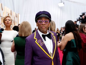 Director Spike Lee, wearing a coat with the number 24 in memory of NBA player Kobe Bryant, at the 92nd Academy Awards.