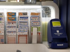 Blank lottery selection forms at a Loto-Québec kiosk in Montreal.