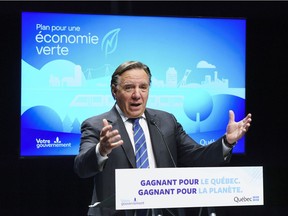 Premier Francois Legault announces his government's green plan during a news conference in Montreal on Monday, November 16, 2020.
