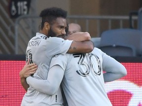 The Montreal Impact celebrate their first goal against the D.C. United in the first half at Audi Field in Washington on Sunday, Nov. 8, 2020.