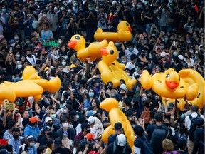 Pro-democracy demonstrators move inflatable rubber ducks during a rally in Bangkok, Thailand November 18, 2020. REUTERS/Soe Zeya Tun