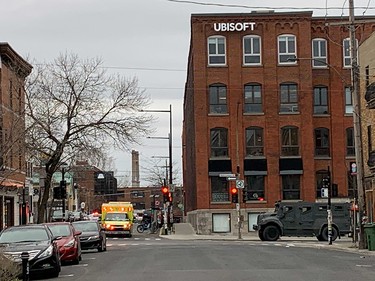 Ambulances arrive during a police operation near the Ubisoft offices in Montreal Nov. 13, 2020.