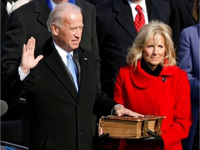 U.S. Vice-President Joe Biden is sworn in as his wife, Jill ,watches during the inauguration ceremony for President Barack Obama in Washington on Jan. 20, 2009.