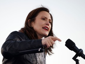 Michigan Governor Gretchen Whitmer speaks ahead of Democratic U.S. presidential nominee and former Vice President Joe Biden, at a campaign drive-in, mobilization event in Detroit, Michigan, U.S., October 31, 2020.   REUTERS/Brian Snyder