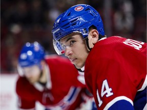 Canadiens Nick Suzuki lines  up for a face-off against the Arizona Coyotes in Montreal on Feb. 10, 2020. For the first time in more than a decade, the Canadiens appear to have a bona fide No. 1 centre in Suzuki, Jack Todd writes.