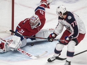 Montreal Canadiens' Carey Price stops Columbus Blue Jackets right-wing Josh Anderson alone in front of the net at the Bell Centre in Montreal on Feb. 19, 2019.