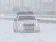 A Sûreté du Québec car in the snow.