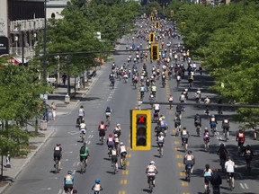 Thousands of cyclists participate in the annual Tour de l'Ile in Montréal, June 3, 2018.