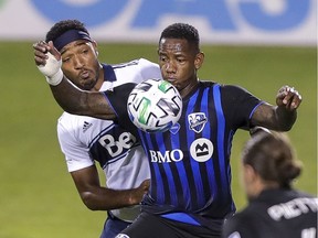 Montreal Impact forward Romell Quioto, holding off Vancouver Whitecaps' Derek Cornelius during MLS game in Montreal on Aug. 25, 2020, was named the team's MVP for 2020.