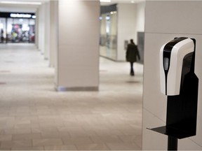 A hand sanitizing station at the Eaton Centre. Most people happily use it, but some just fake the motions, Josh Freed writes.